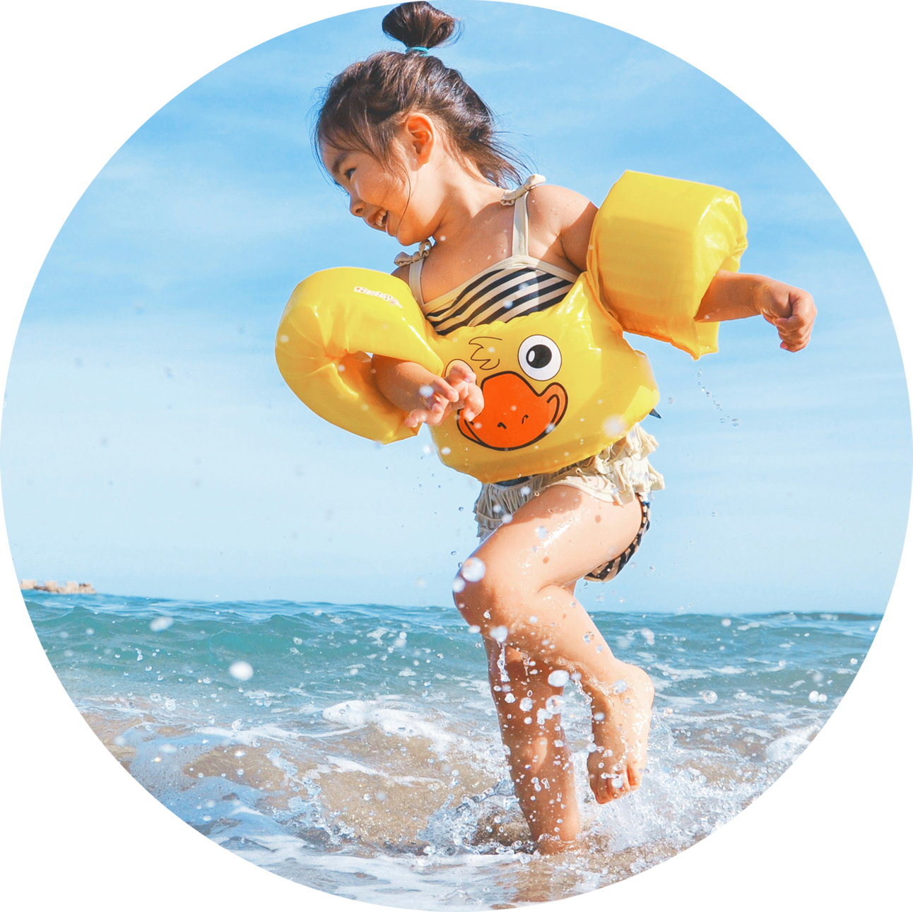 girl playing on a beach